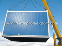 Loading sandwich panel container unit with installed water treatment system